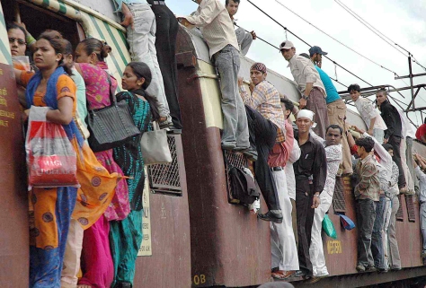TRAIN OVER LOADED WITH PASSENGERS